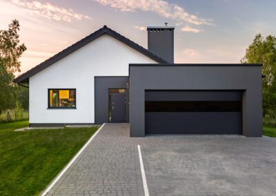 Modern house with garage overhead doors